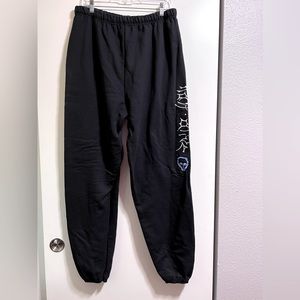 Black sweatpants with graphics